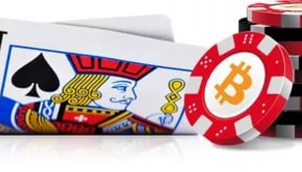 Blackjack with stack of chips and bitcoin logo